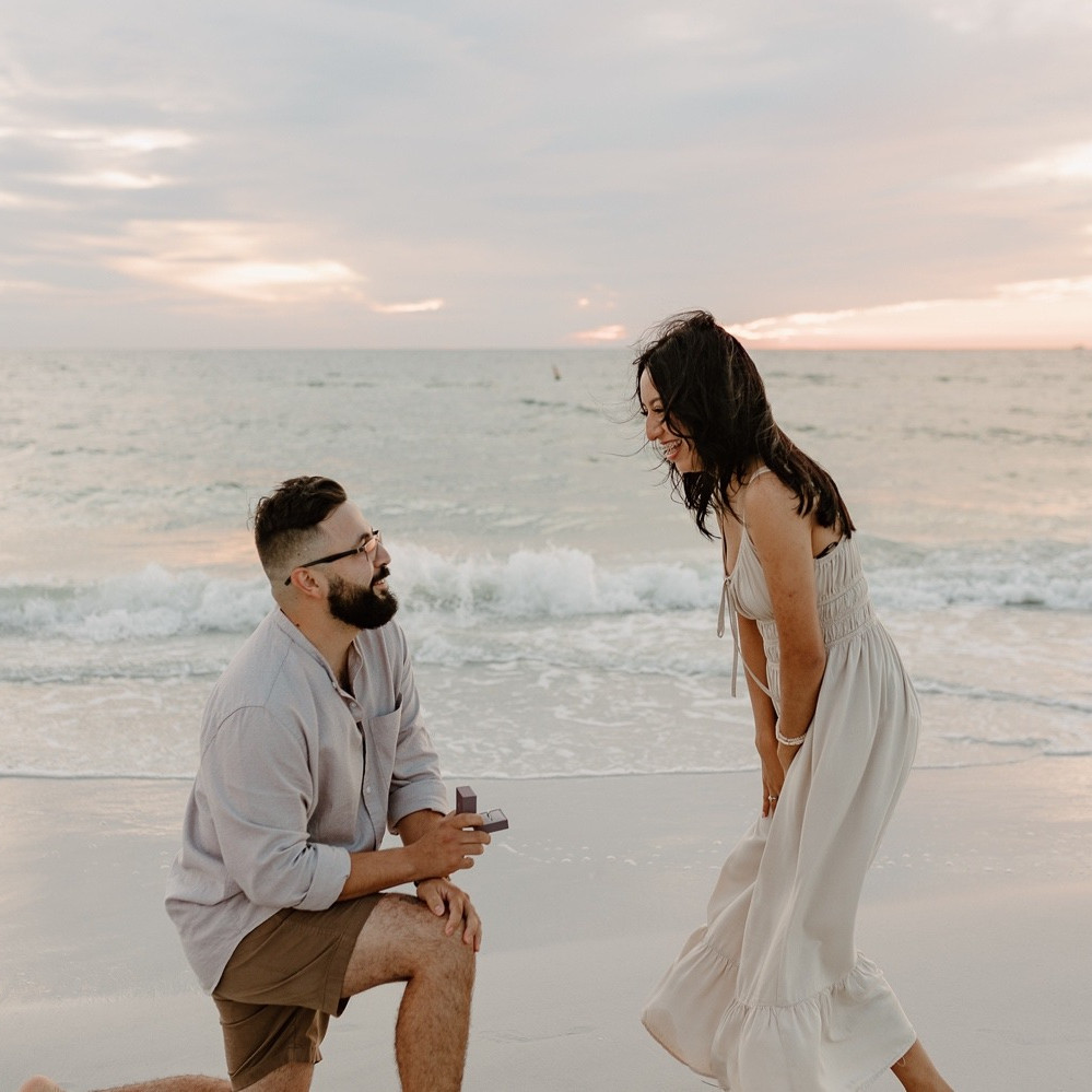 Surprise beach marriage proposal captured by professional photographer in Perdido Key FL. |Proposal Photography in St. Pete Beach Florida